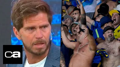 El Pollo Vignolo fue apretado por un hincha de Boca en la calle El Pollo Vignolo fue apretado por un hincha de Boca en la calle