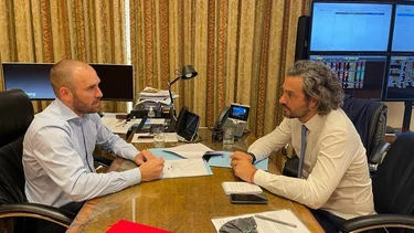 Antes de su viaje a Estados Unidos, Cafiero se reunió con Guzmán por el FMI
