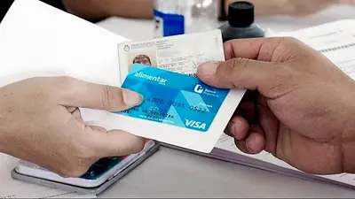Pago realizado por una usuaria de la Tarjeta Alimentar Pago realizado por una usuaria de la Tarjeta Alimentar