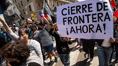 Foto de archivo de una protesta en Chile contra la inmigración en octubre de 2021. Foto de archivo de una protesta en Chile contra la inmigración en octubre de 2021.