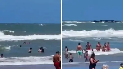 El video del rescate de tres nenes que quedaron atrapados entre olas en Mar del Plata El video del rescate de tres nenes que quedaron atrapados entre olas en Mar del Plata