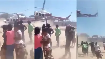 Crisis: El gobierno de Salta lanza comida desde un helicóptero y la gente se desespera por los alimentos Crisis: El gobierno de Salta lanza comida desde un helicóptero y la gente se desespera por los alimentos