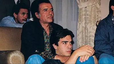 Fotografía del ex presidente Carlos Menem y su hijo Fotografía del ex presidente Carlos Menem y su hijo