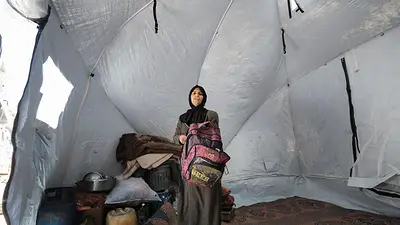 Familia en Gaza, desarraigada por la reanudación de la guerra, enfrenta más dificultades Familia en Gaza, desarraigada por la reanudación de la guerra, enfrenta más dificultades