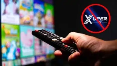 Televisor, control remoto, logo de xuper tv prohibido Televisor, control remoto, logo de xuper tv prohibido