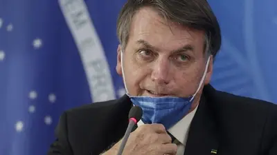 Coronavirus: polémica en Brasil por el meme de Jair Bolsonaro bailando con ghaneses y un ataúd Coronavirus: polémica en Brasil por el meme de Jair Bolsonaro bailando con ghaneses y un ataúd