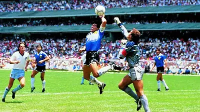 Diego Maradona y "La Mano de Dios" Diego Maradona y "La Mano de Dios"