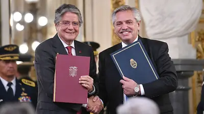 Guillermo Lasso y Alberto Fernández Guillermo Lasso y Alberto Fernández