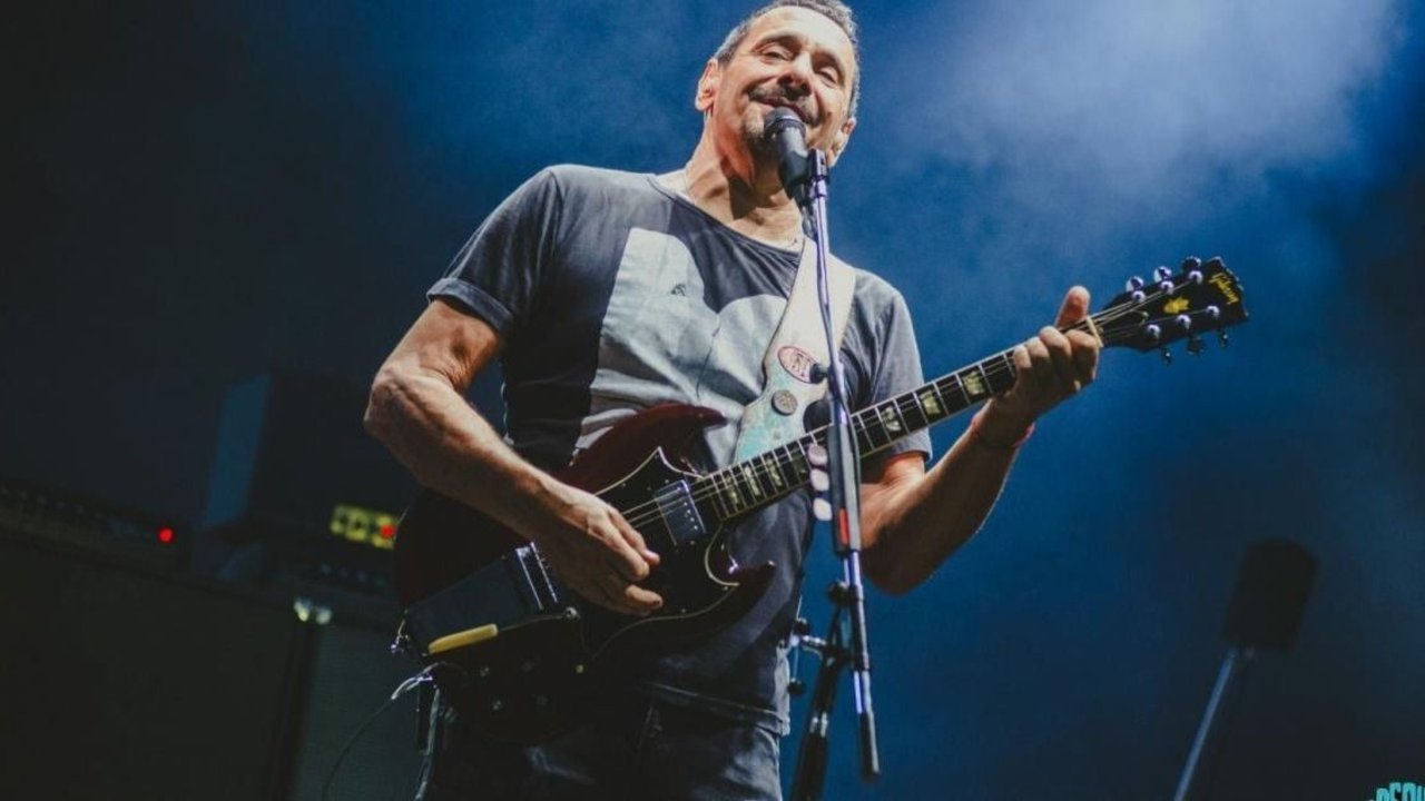 Ricardo Mollo en el recital de Divididos