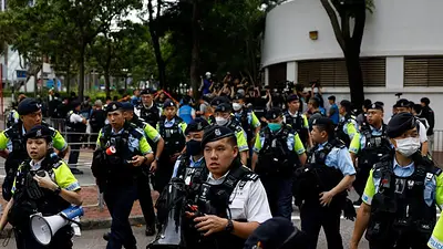 Declaran culpables a 14 activistas en Hong Kong en un juicio por subversión Declaran culpables a 14 activistas en Hong Kong en un juicio por subversión