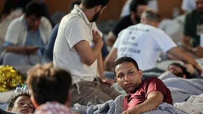 Un año después de la catástrofe del barco de migrantes en Grecia, los familiares exigen respuestas Un año después de la catástrofe del barco de migrantes en Grecia, los familiares exigen respuestas