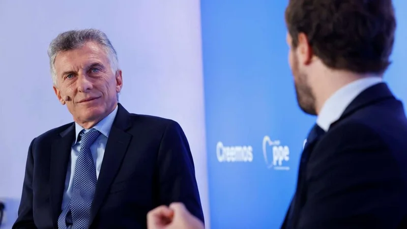 Mauricio Macri en España con Pablo Casado del PP.