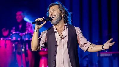 Fotografía de Diego Torres durante un recital en vivo Fotografía de Diego Torres durante un recital en vivo
