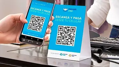 Imagen de un usuario de Mercado Pago abonando su consumo con la app Imagen de un usuario de Mercado Pago abonando su consumo con la app