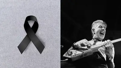 Símbolo de luto y John Mayall Símbolo de luto y John Mayall
