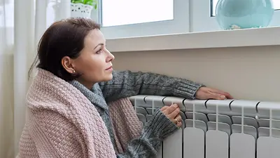 Mujer en una estufa Mujer en una estufa