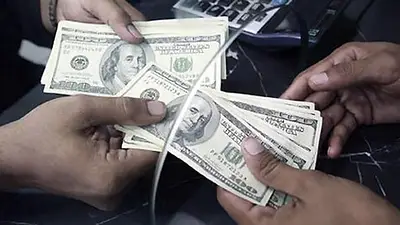 Compra de dólares. Compra de dólares.