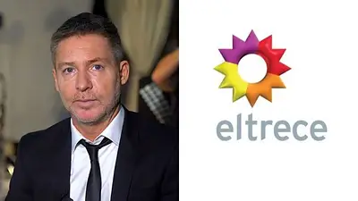 Adrián Suar y el logo de El Trece Adrián Suar y el logo de El Trece