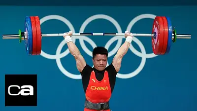 Chino Li Fabin retiene el oro en la categoría de 61 kg en halterofilia Chino Li Fabin retiene el oro en la categoría de 61 kg en halterofilia