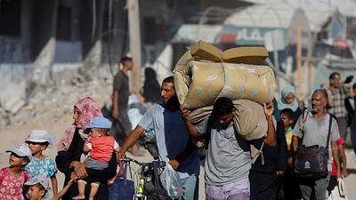 Familias huyen de nuevo ataque israelí en Gaza Familias huyen de nuevo ataque israelí en Gaza