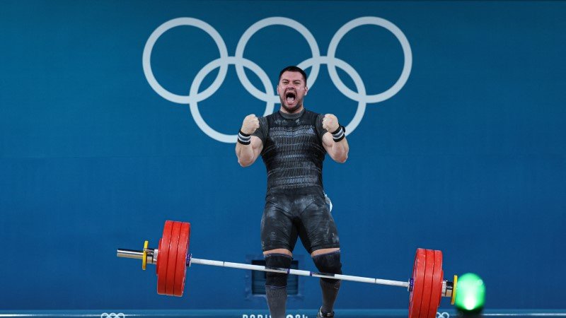 El chino Liu se adjudica el oro en la categoría masculina de halterofilia de 102 kilos