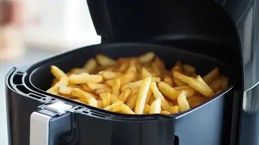 ¿Cuál es el secreto para cocinar papas fritas crocantes con la freidora de aire?
