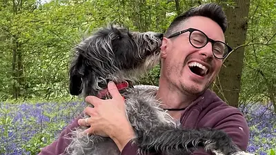 Perro y su dueño Perro y su dueño
