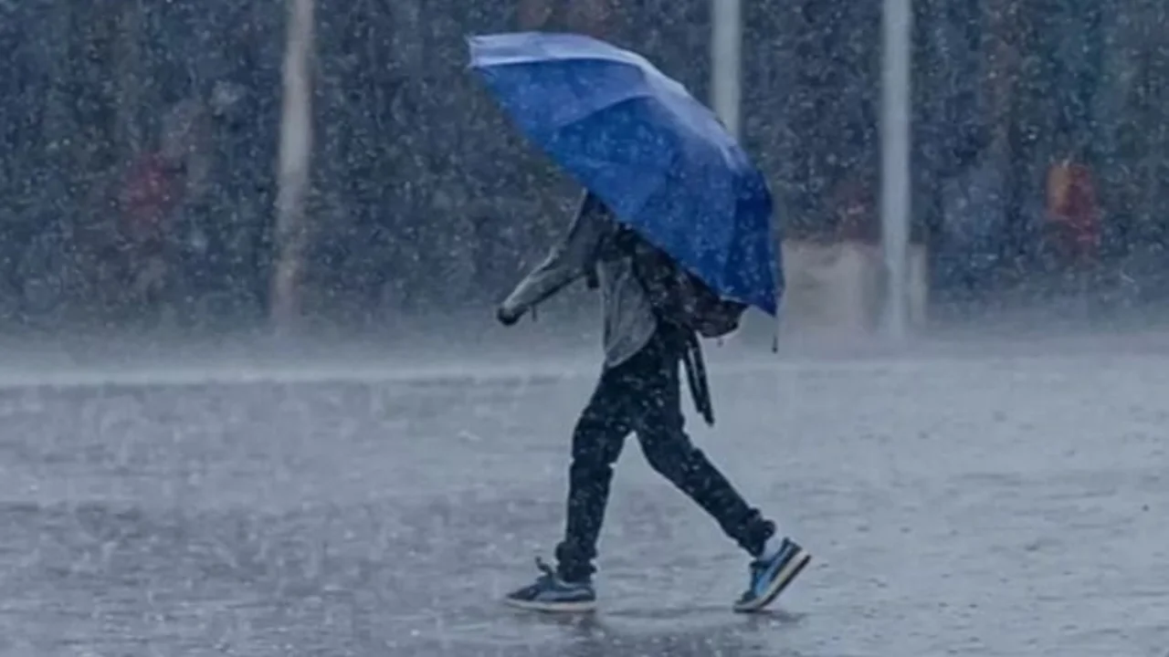 Persona bajo la lluvia