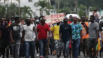 "No somos criminales", claman cientos migrantes en protesta al sur de México "No somos criminales", claman cientos migrantes en protesta al sur de México