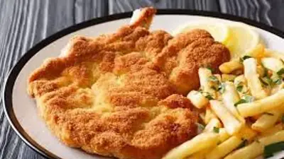Milanesa con papas fritas Milanesa con papas fritas