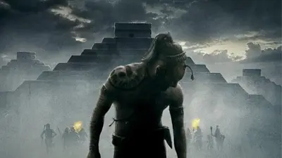 Póster de la película Apocalypto. El personaje principal a la sombra de una ciudad maya Póster de la película Apocalypto. El personaje principal a la sombra de una ciudad maya
