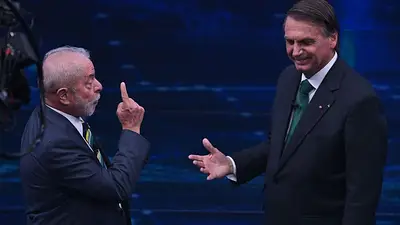 En un debate presidencial más tranquilo, Lula y Bolsonaro compararon sus gestiones En un debate presidencial más tranquilo, Lula y Bolsonaro compararon sus gestiones