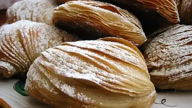 Receta de sfogliatella italiana: masa crujiente y relleno de ricota