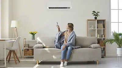 Persona con aire acondicionado. Persona con aire acondicionado.
