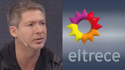 Adrián Suar y el logo de El Trece Adrián Suar y el logo de El Trece