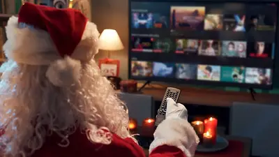 Santa Claus ve televisión Santa Claus ve televisión